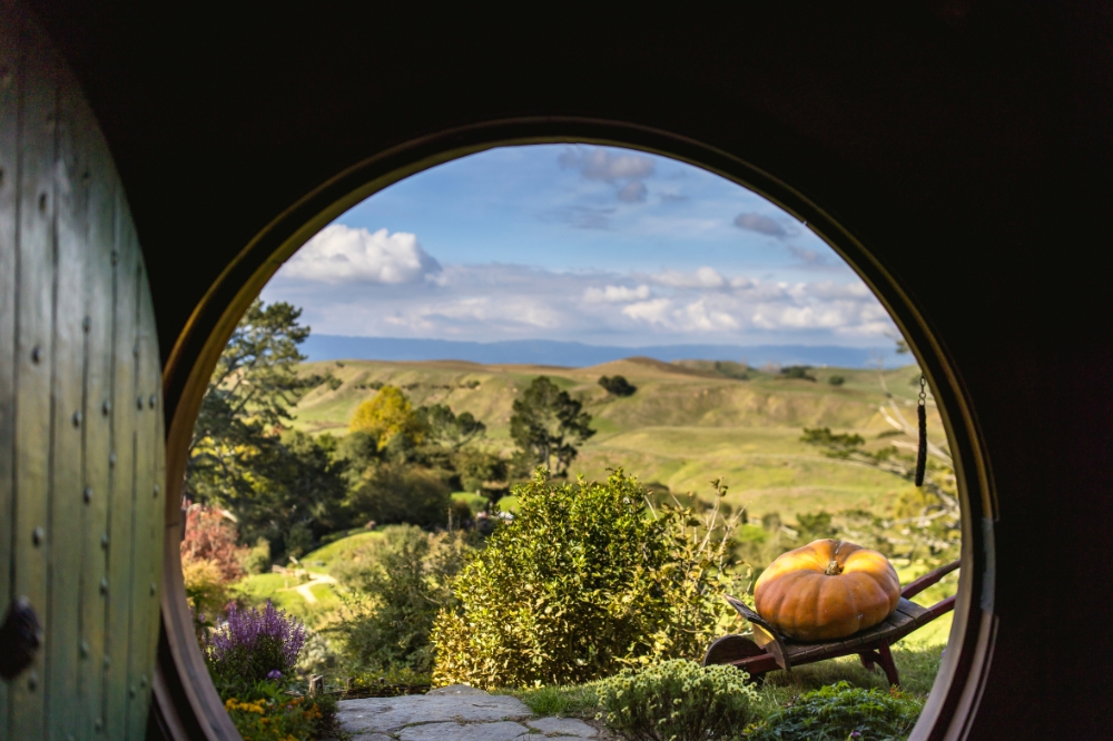 The view from a house with a round door at the Hobbiton™ Movie Set