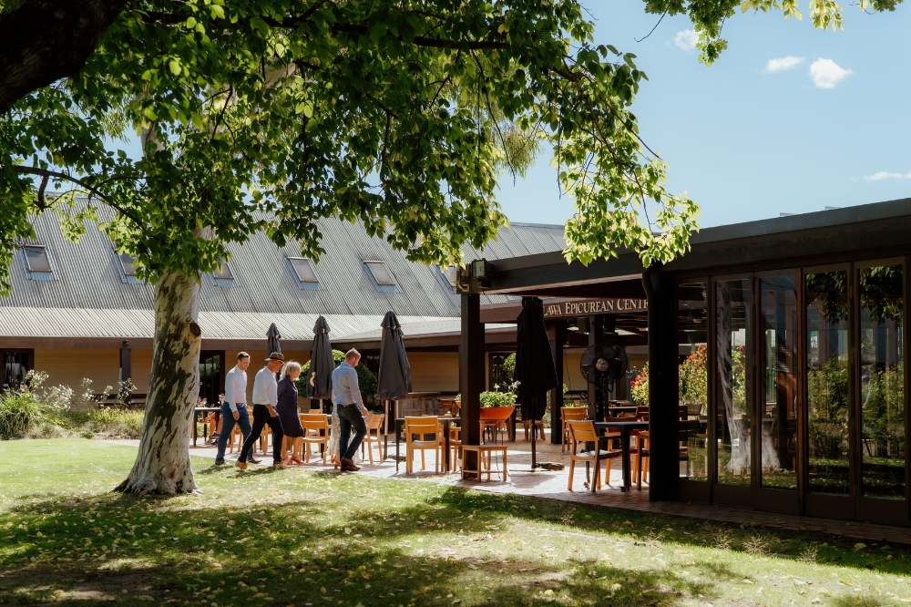 People walk towards a restaurant